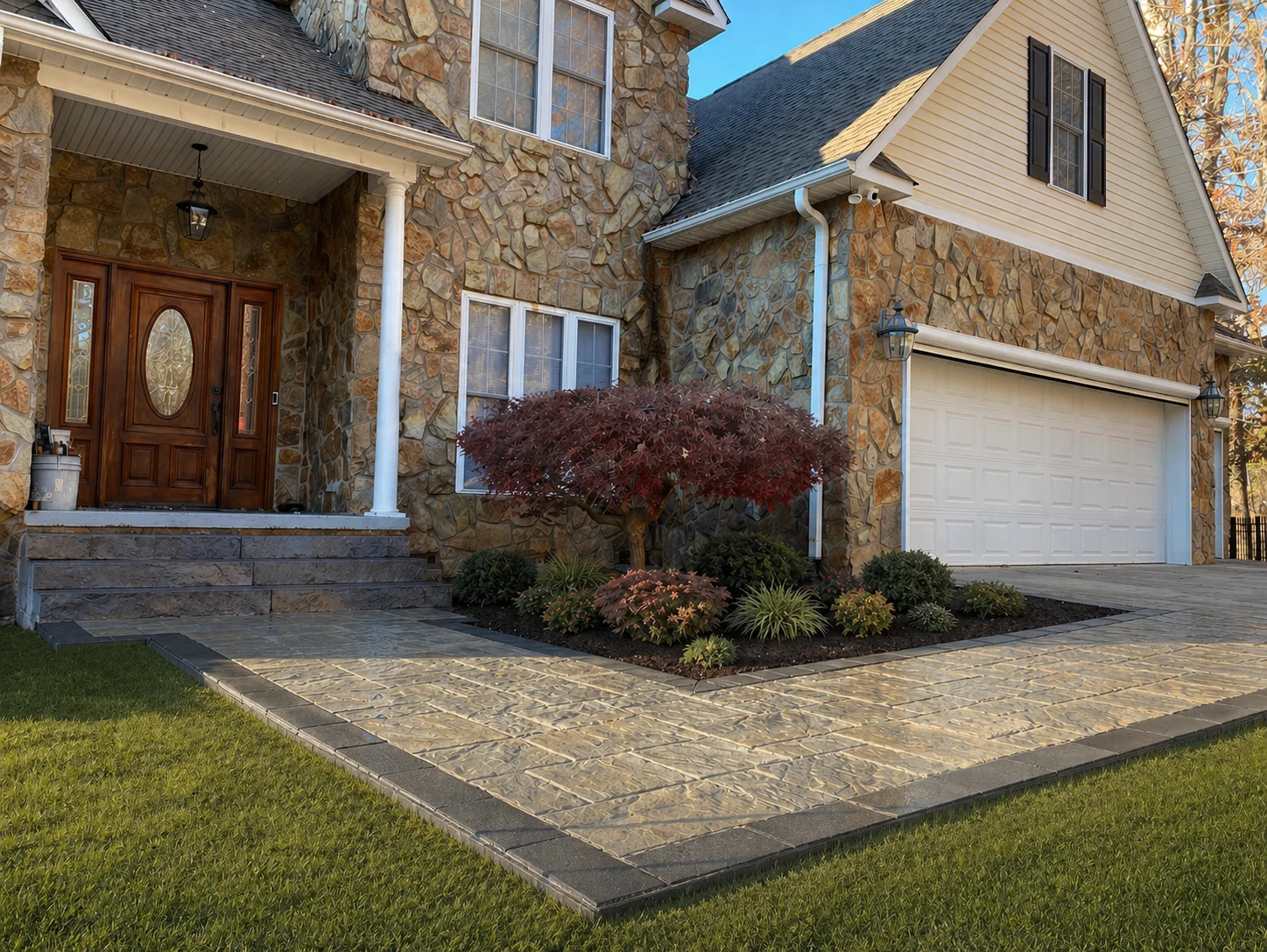 After: completed hardscape walkway and front entry by Bollman Landscape