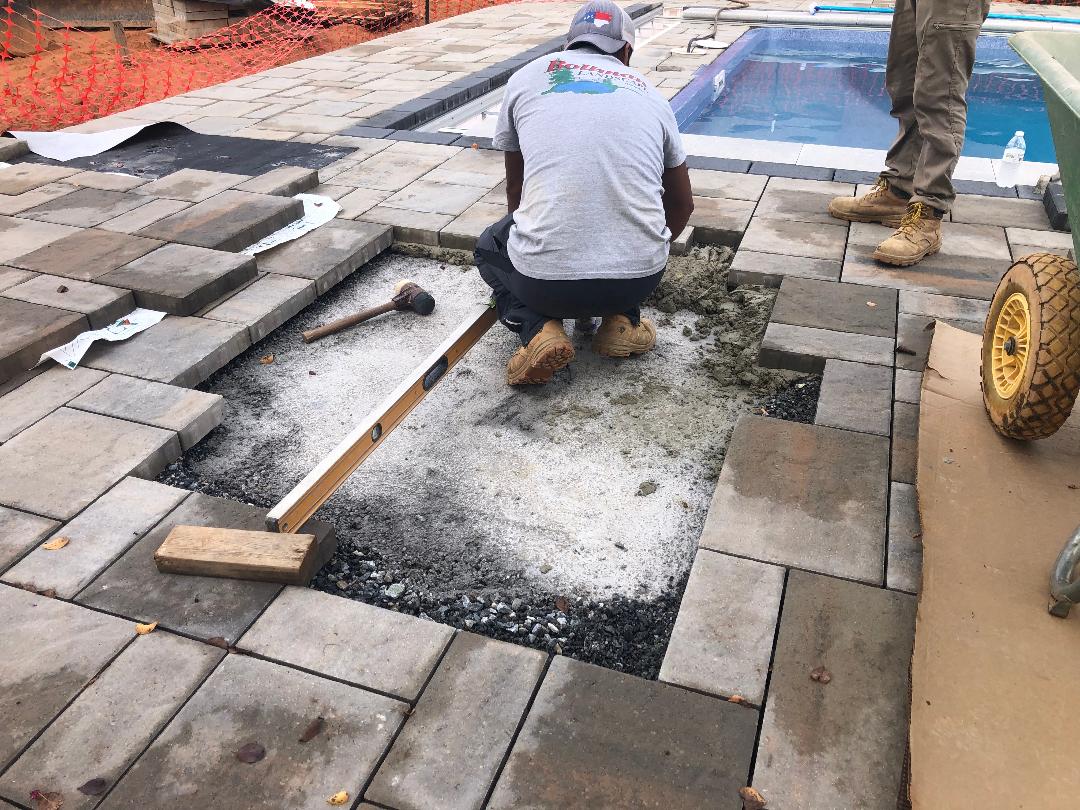 Bollman Landscape hardscape team at work on a professional installation