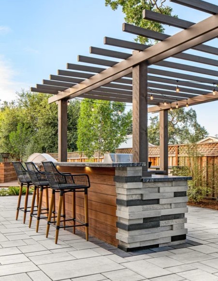 Custom outdoor kitchen design and build by Bollman Landscape