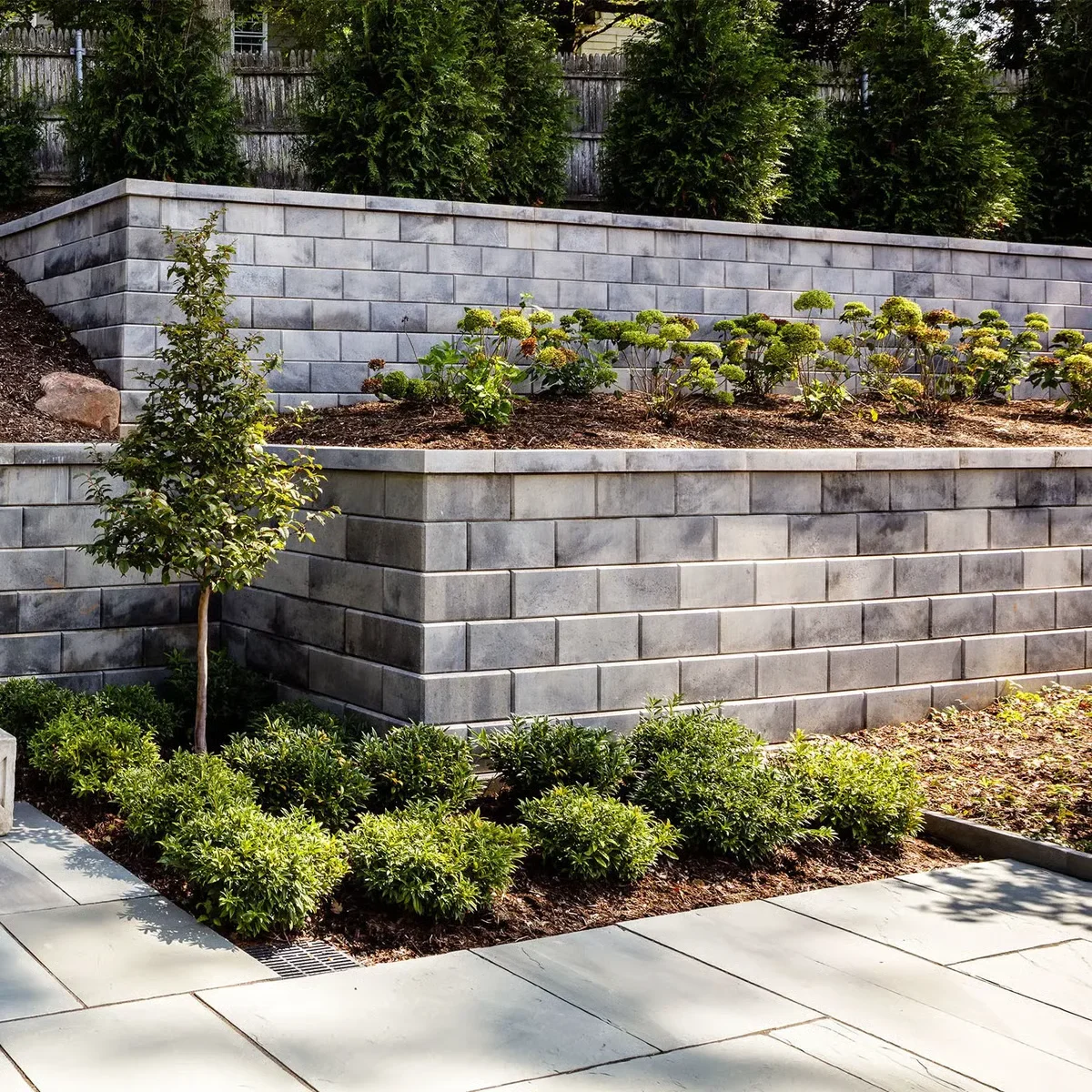 Completed retaining wall project by Bollman Landscape